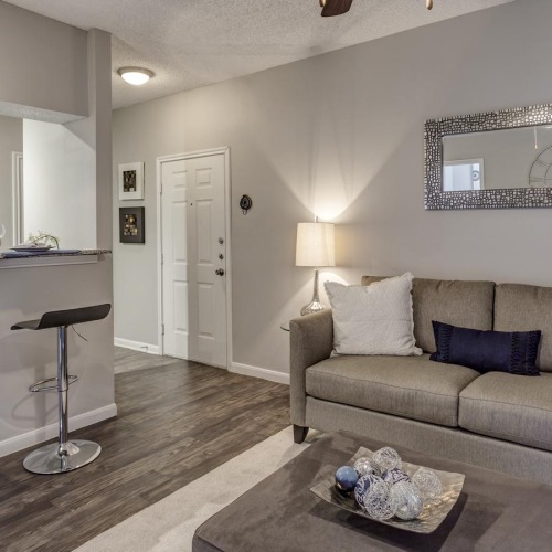 a living room with a couch and a table