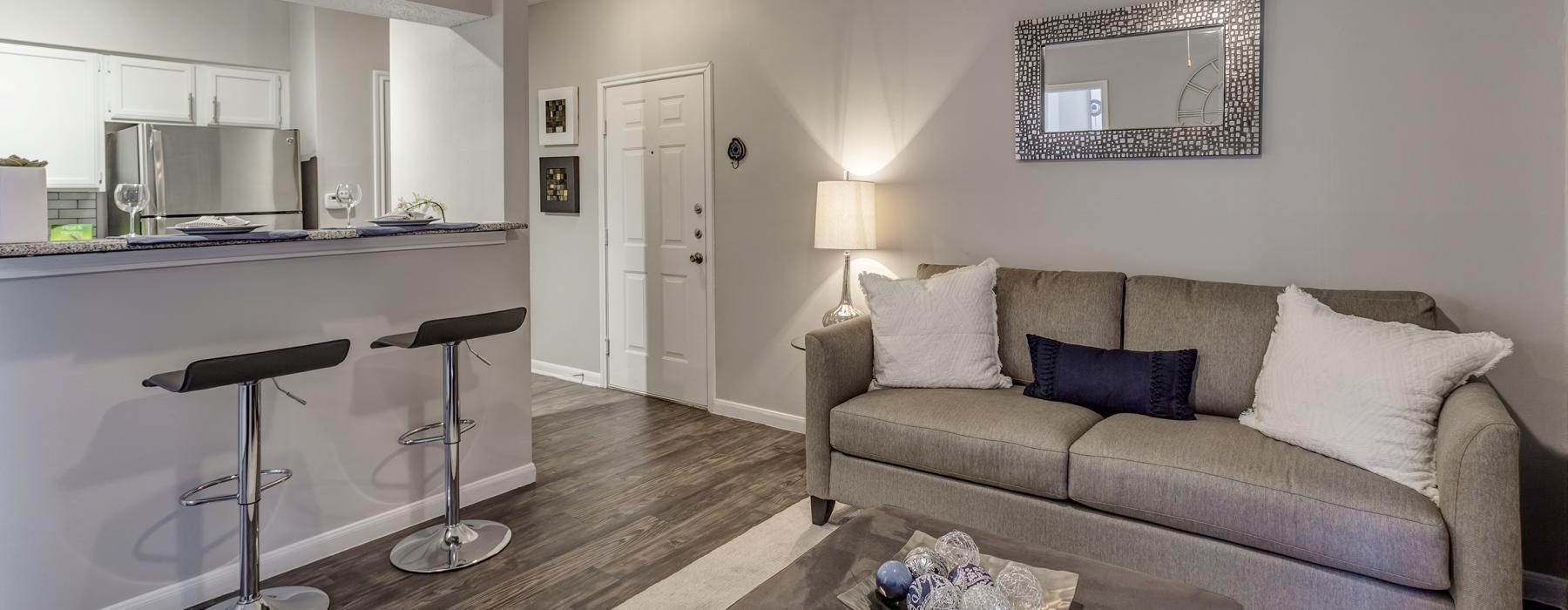 a living room with a couch and a table